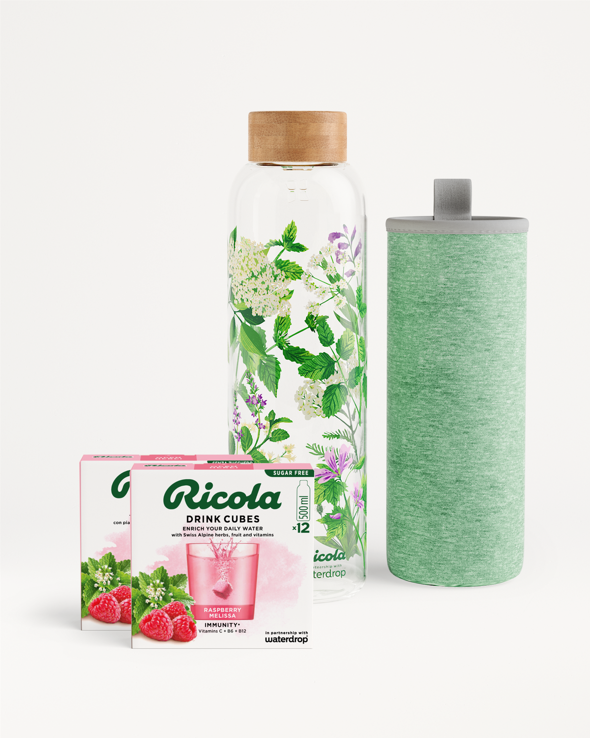 Ricola Bottle Set: Ricola Drink Cubes, glass bottle, green sleeve.