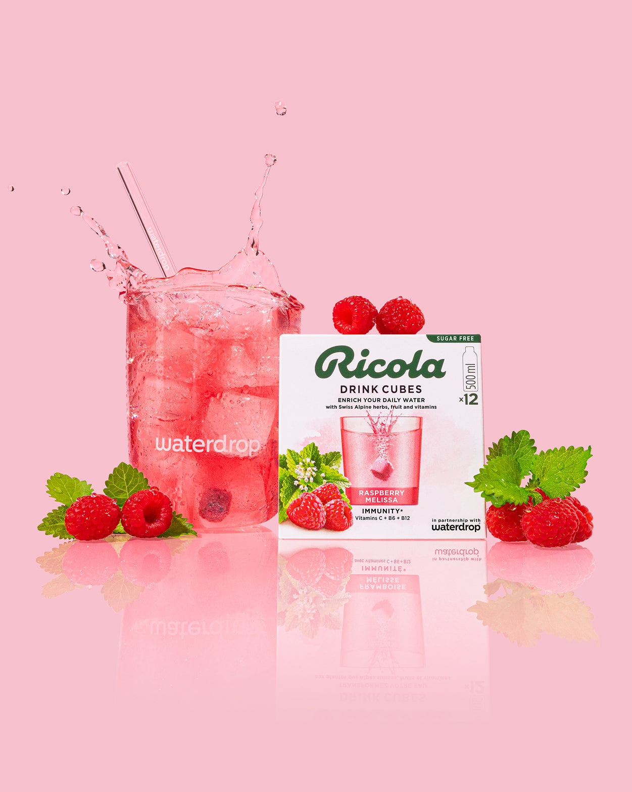 Ricola Discovery Set with raspberry melissa cubes and branded glass.