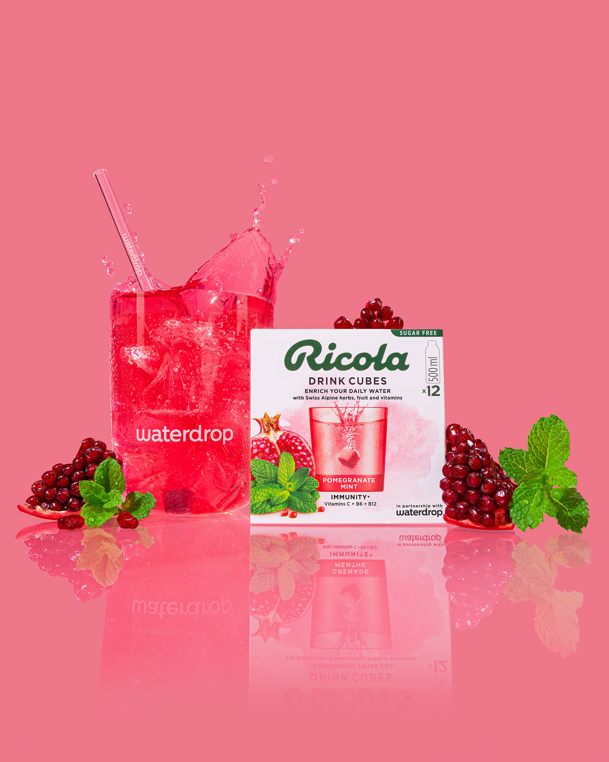 Ricola Discovery Set: Waterdrop glass with Pomegranate Mint drink cubes.