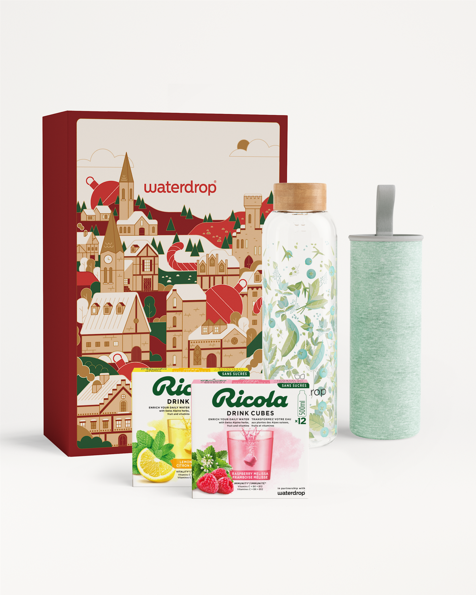 Ricola Glass Gift Set with bottle, sleeve, and drink cubes.
