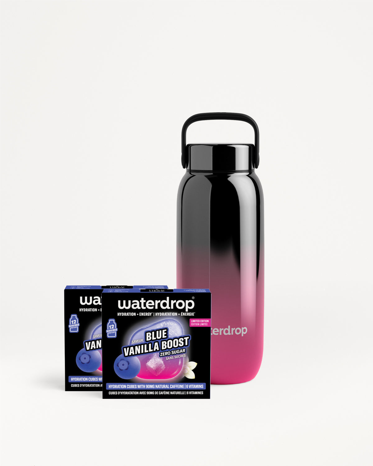 Višestruka boca za ponijeti s crno-ružičastim gradijentom i ručkom uz kutiju Waterdrop proizvoda.